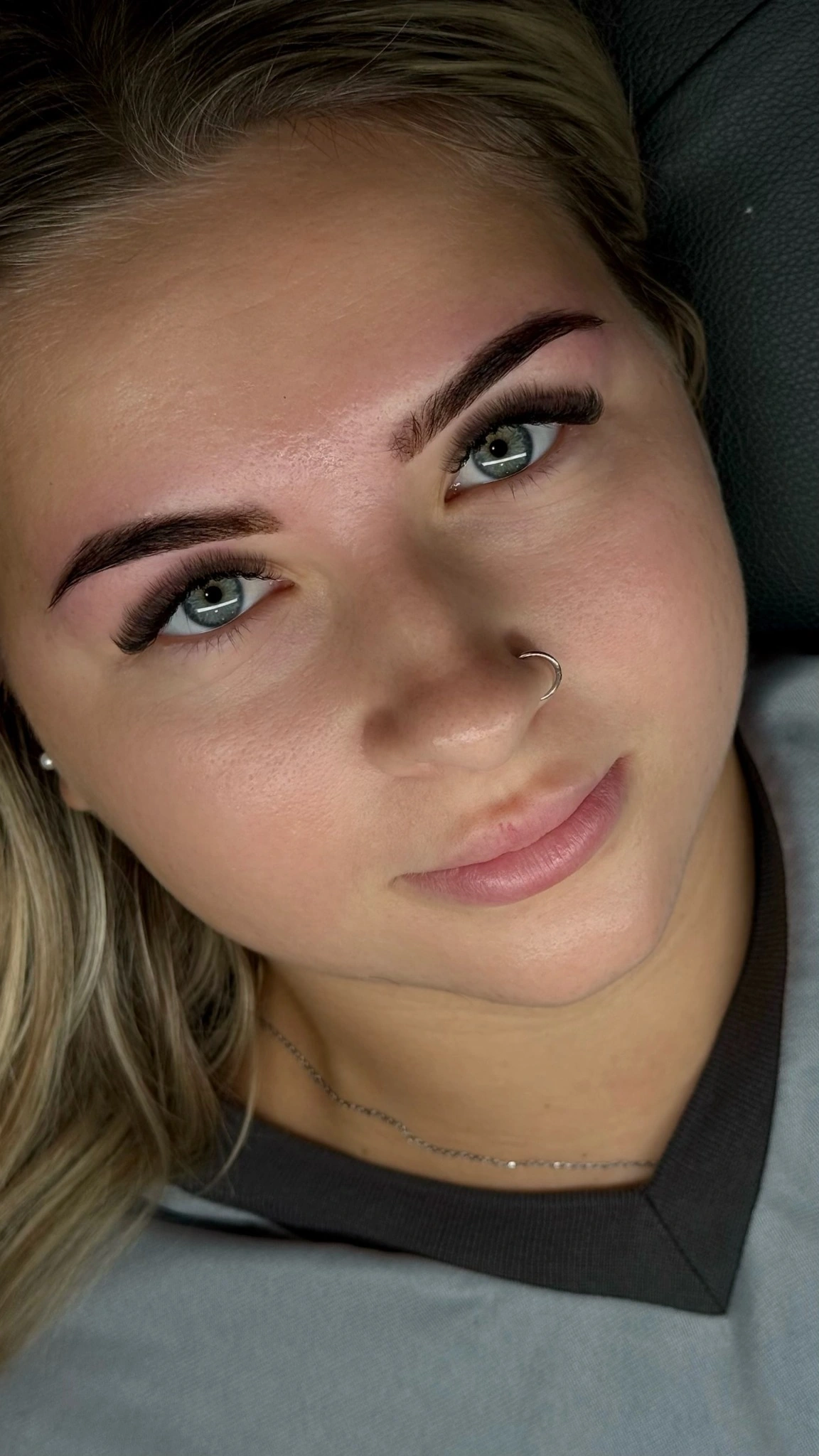 Close-up of a Lash Inspire client’s full lashes and defined brows