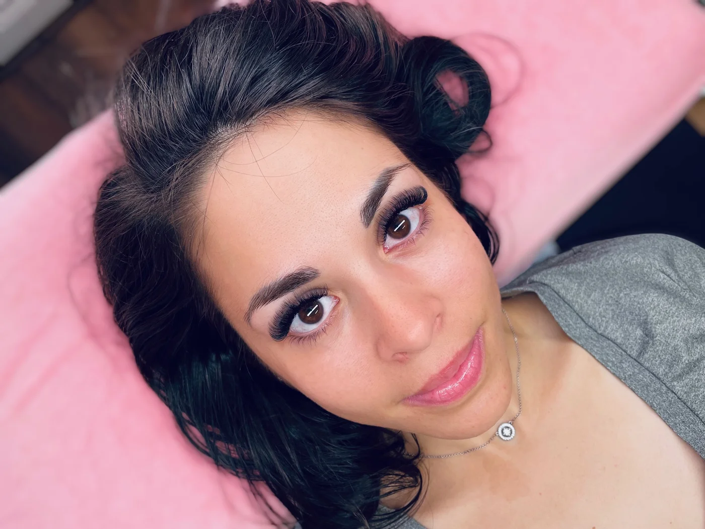 A client's finished lash and brow look